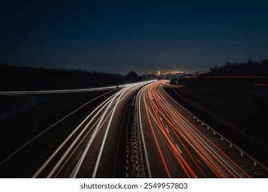Nighttime Highway with Long Exposure Light Trails Leading to the City of Pásztó, Hungary - Powered by Shutterstock - Get 15% off with code: PIKWIZARD15