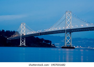 Nighttime Image Of Bay Bridge In San Francisco, California.