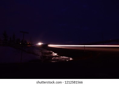 Nighttime Photography Of Passing Car Lights