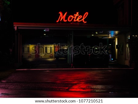 Nighttime shot of vintage small motel on a rainy night