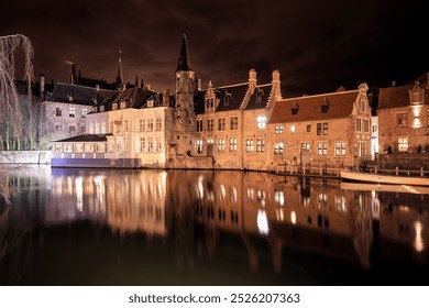 Nighttime view of historic buildings reflecting on the water in Brussels, capturing the charm of the city after sunset - Powered by Shutterstock