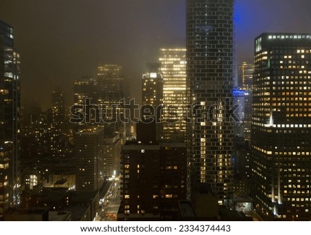Nighttime view of skyscrapers at 8th Avenue in New York City