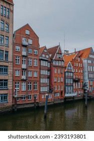 The Nikolaifleet, a canal in the old town (Altstadt) of Hamburg, Germany. It is considered one of the oldest parts of the Port of Hamburg. - Shutterstock ID 2393193801