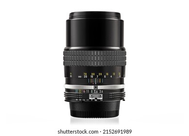 NIKON NIKKOR 135mm F3.5 Ai LENS: Plymouth Devon UK May 3rd 2022: Classic Nikon Nikkor Telephoto Prime Portrait Lens. Classic Nikon Ai Lens for 35mm Film Camera with Built in Hood Clipping Path in JPEG
