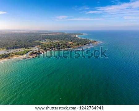 Nilaveli beach in Trincomalee, Sri Lanka. Back Bay of Indian Ocean near Trincomalee Town,  coastal resort city. Panoramic Top View on beach in Trincomalee.