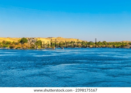 The Nile River near the famous Nubian village.  Aswan, Egypt – October 17, 2023