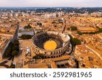 Nimes Arena aerial panoramic view. Nimes is a city in the Occitanie region of southern France