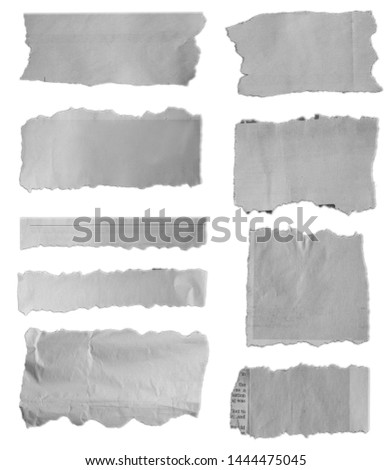 Nine pieces of torn paper on plain background 