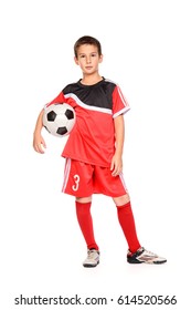 Nine Year Old Boy Football Player In His Uniform With A Soccer Ball. Full Length Portrait. Isolated Over White.