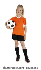 Nine Year Old Girl Holding Soccer Ball Isolated On White.