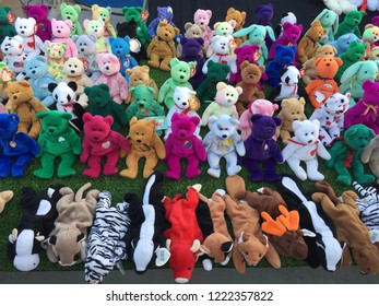 Ninja Market Place, Chonburi province, Thailand-4 November 2018. Various bear doll and dear, squirrel, pig, cow, fox, zebra doll in a row on the green floor for showing and selling. 