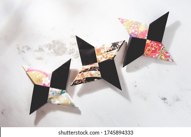 A ninja shuriken made from origami. Japanese culture.