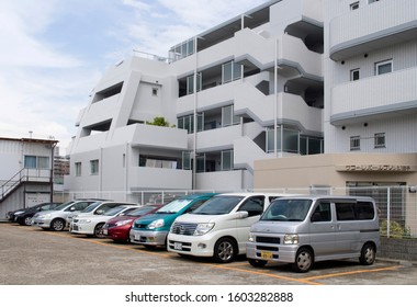 Nishimaiko, Hyogo, Japan - July 14, 2013:
Ordinary Residential Alley With Houses And Parked Cars.
