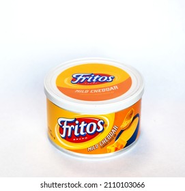 NISSWA, MN - 19 JAN 2022: Container Of Fritos Brand Mild Cheddar Flavored Cheese Dip, Isolated On White Background.