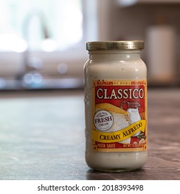 NISSWA, MN - 2 AUG 2021: Jar Of Classico Creamy Alfredo Pasta Sauce.