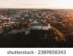 Nitra Castle and streets of Nitra city on sunset - autumn time. Aerial view of beautiful and fairytale Nitra Castle.