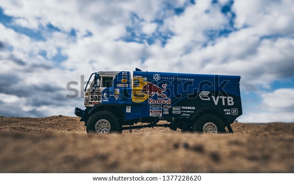 NITRA, SLOVAKIA - APRIL 19 2019:\
Scale model Kamaz 4326 Rally Dakar no.500 Nikolaev in desert. Truck\
on Rally Dakar. Truck Kamaz in desert. Scale model in\
sand.