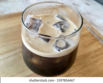 Nitro Coffee In The Glass For Drink On Wood Table Texture