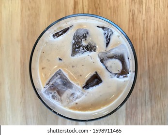 Nitro Coffee In The Glass For Drink On Wood Table Texture