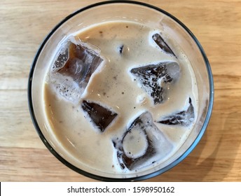 Nitro Coffee In The Glass For Drink On Wood Table Texture