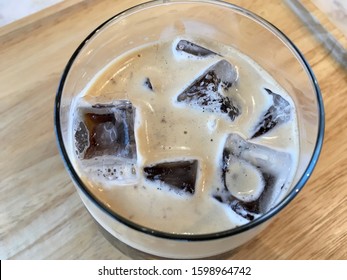 Nitro Coffee In The Glass For Drink On Wood Table Texture