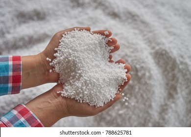 Nitrogen Fertilizers Or Urea Fertilizer In Farmer Hand. Blur
White Fertilizer Background.