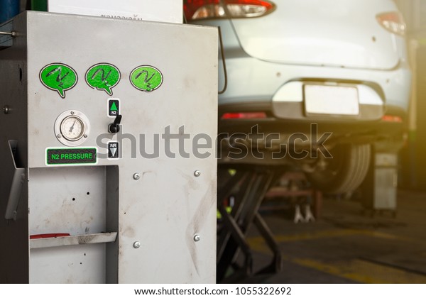 Nitrogen tire filling system machine in a garage.\
Nitrogen Air Pump.