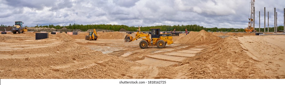 Nizhniy Novgorod, RUSSIA - september 16, 2020:  panorama of the construction site, earthworks are in progress to create the base of the foundation behind the prominent concrete columns                