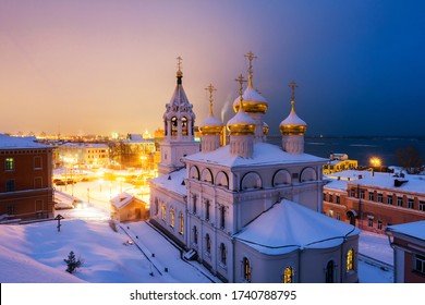 Nizhny Novgorod, Russia. Aerial view of Church of the Nativity of John the Precursor in Nizhny Novgorod, Russia at night in winter. Snow and colorful sunset sky - Shutterstock ID 1740788795