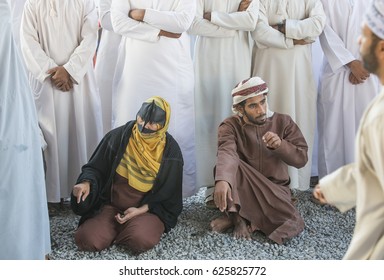 Nizwa, Oman, 24th March, 2017: Omani Couple With A Goat At A Market