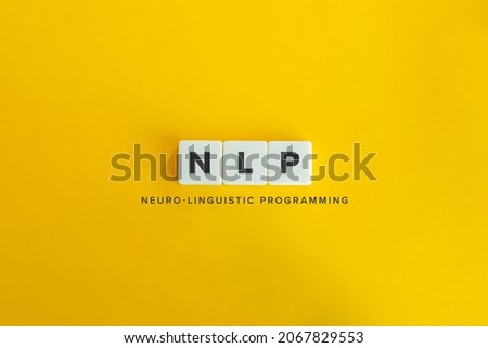 NLP (Neuro-linguistic programming) banner and concept. Block letters on bright orange background. Minimal aesthetics.