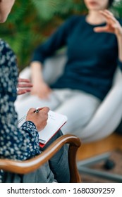 NLP or Neuro-linguistic Programming Practitioner having a Conversation with a client