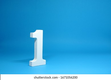 No. 1 ( One ) Isolated Blue  Background With Copy Space - Number 1 Percentage Or Promotion Success And The Best Winner Concept - First Onject