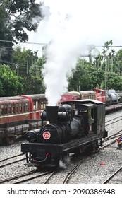 No. 25 Shay Steam Locomotive Is Driving In The Station With Smoke.