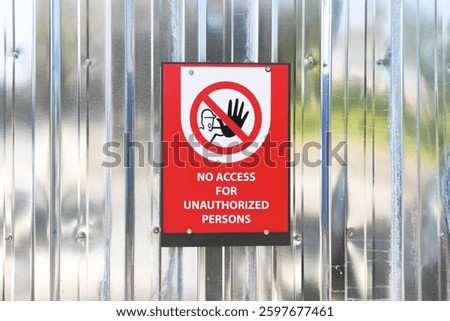 No access for unauthorized persons. Warning sign indicating restricted area.