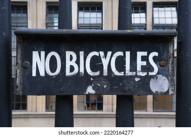 No Bicycles Sign On The Fence