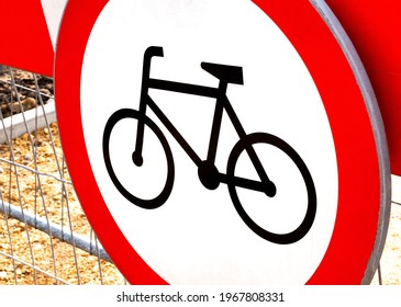 No bikes allowed, round red warning biking prohibition sign, simple symbol object detail, closeup, nobody. No bicycles, bikers, cyclists allowed in the area, no cycles, cycling disallowed concept - Shutterstock ID 1967808331