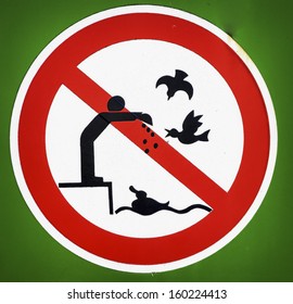 No Bird Feeding Sign At A Lake