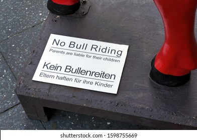 No Bull Riding. Parents Are Liable For Their Children. Bilingual Warning Sign In German And English. 