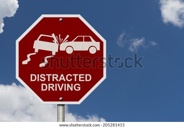 No\
Distracted Driving Sign, Red stop sign with words Distracted\
Driving and accident icon with sky\
background