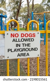 No dogs allowed in the playground area sign in the park - Shutterstock ID 2198015561