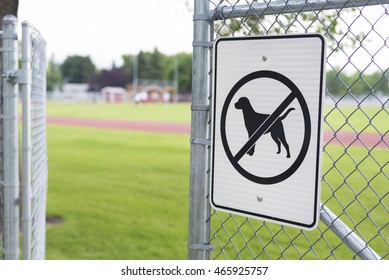 no dogs allowed sign at gated sports complex.  - Shutterstock ID 465925757