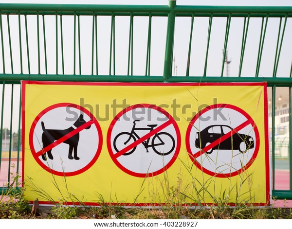 No dogs allowed sign in running, No bikes, No Car in the\
running 