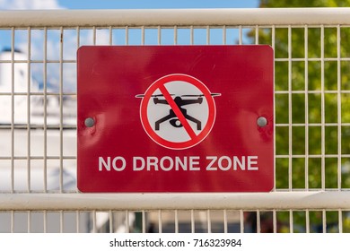 No drone zone sign on a fence
