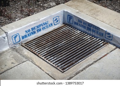 No Dumping Drains To Ocean Warning On Storm Drain                               