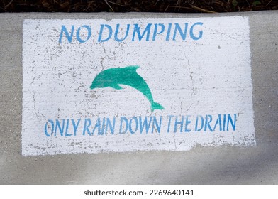 No dumping only rain down the drain dolphin image Malibu California