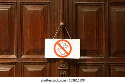 No Entry Or Don't Touch Sign On An Old Door