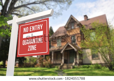 A No Entry Quarantine Zone in front of a Three story house.