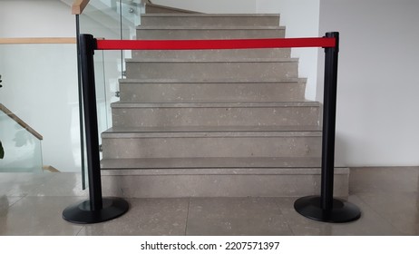 No Entry Red Velvet Rope Barrier In Front Of A Stairway