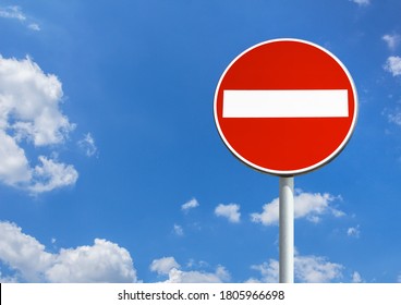 No entry sign against blue sky with copy space - Shutterstock ID 1805966698